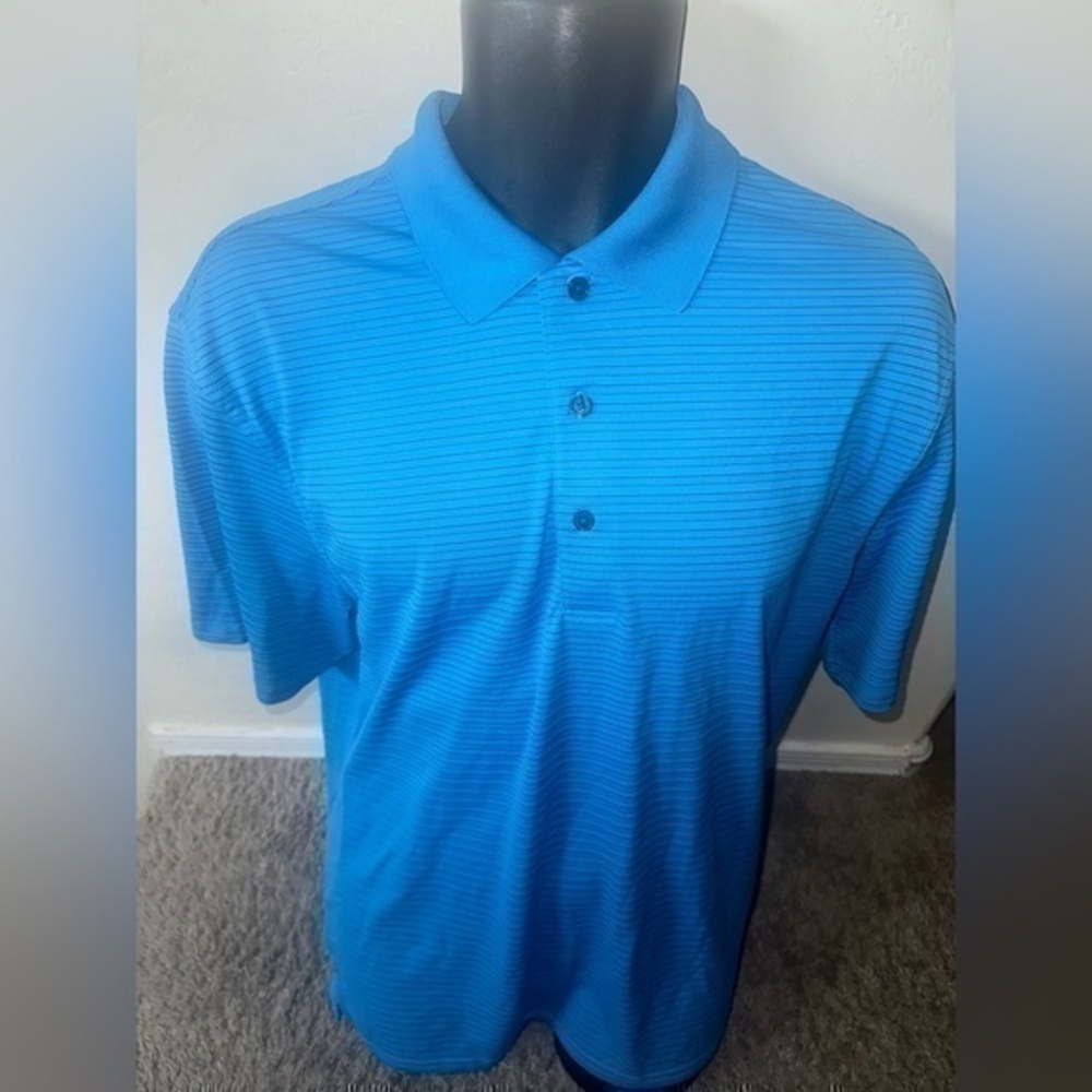Men’s used Greg Norman blue polo golf shirt size M medium